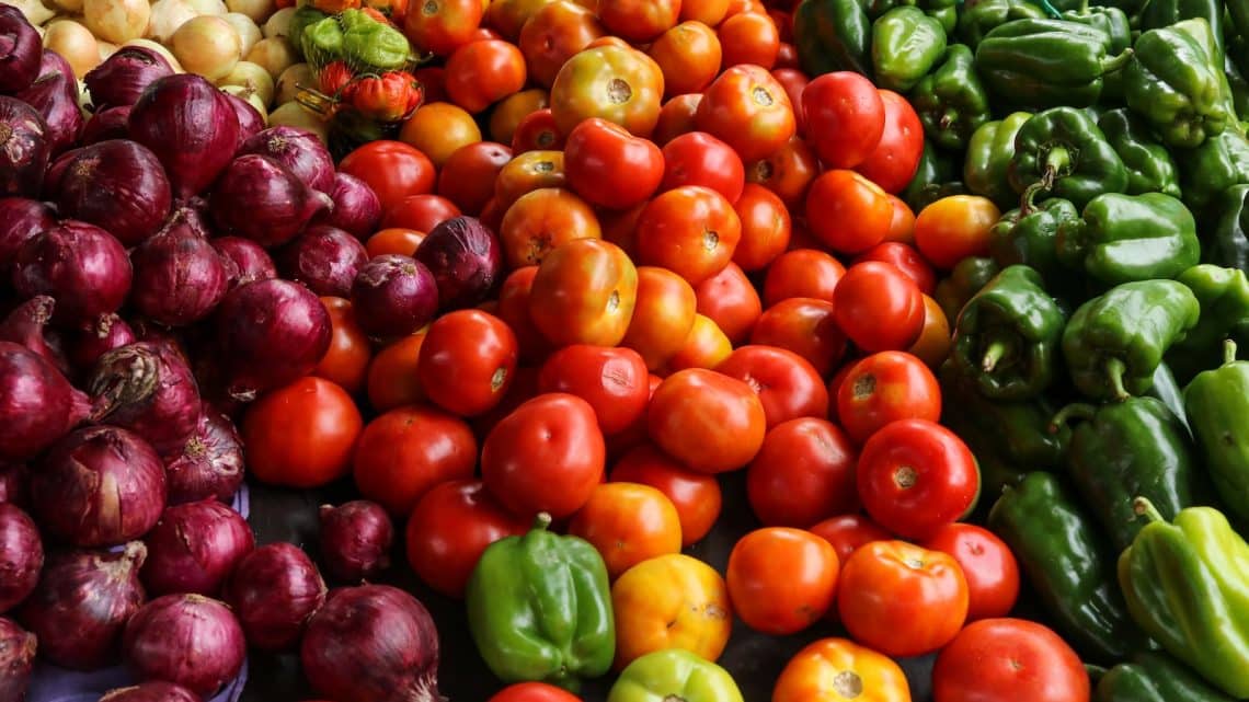 a pile of colorful peppers